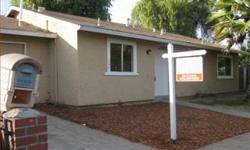 Nicely updated honme with a convenient walking/short drive to the Gilroy outlet mall. Interiors have new kitchen, granite counters, maple cabinets, tiled floors. New baths with marble vanity, tiled floors, new paint, new carpet. Part of garage was