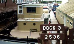 Looking for a house barge at the "RIGHT PRICE", this is the one. Legal 49' X 17' Housebarge! This 1939 housebarge, originaly a gravel barge in the 40's was converted to a houseboat in the 50's needs attention, but could be a dynamite place with the right