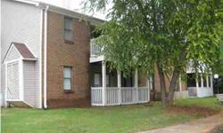 Downstairs unit, ready for new owners! Recently updated kitchen with new countertops and stainless appliances! Newer carpet and paint. Brick Fireplace in Great Room and built ins! Large covered porch. All exterior maintenance and landscaping is included
