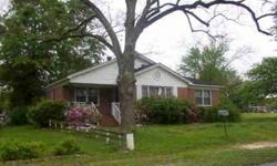 This brick and frame home has recently been freshly painted and has new flooring. It also has new kitchen appliances. The living room is a spacious 21 x 15 with a fireplace. The formal dining area is open to the living room. Full glass storm window lets