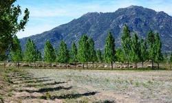 REDUCED OVER $50,000 FOR IMMEDIATE SALE!!!Beautiful 2+ acre cul-de-sac equestrian lot. Perimeter 4 rail pipe fence with stone columns. Breathtaking 360 degrees views to Granite Mountain & Table Mesa Mountain. Award winning master planned community