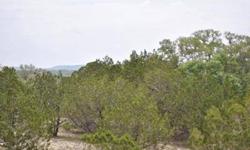 2.12 acre lot that is close to town but still has that secluded feel to it. Come out and pick your building site. At the top terrace of the property you have some beautiful views of the surrounding hills. Property is fenced in the back and marked with