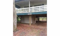 Home is located in the country, the property amenities include oak trees and other scrubs. Home features a nice view from the front porch. Come make an offer. Needs TLCTheresa Kelly is showing this 2 bedrooms / 1 bathroom property in DADE CITY. Call (352)
