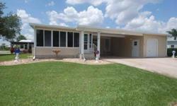 SITUATED ON LARGE CORNER LOT THIS VERY WELL MAINTAINED 2/2 IS LOADED WITH EXTRAS. BUILT TO NEW CODE, STRUCTURAL ROOF ON FLORIDA ROOM, CARPORT AND SHED. TINTED WINDOWS THRU-OUT FOR PRIVACY AS WELL AS LOWER ELECTRIC COSTS, EXTRA LARGE TILED FLA.ROOM WITH