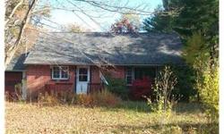 BANK SAYS SELL! - This brick Cape Cod style home has good bones but needs some love. Home features three bedrooms, hardwood flooring throughout, formal dining room, full basement and one car garage. Situated on just under half an acre in a quiet rural