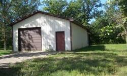 2.48 acres just outside of city limits. Very nice 24x56 building (not insulated) with 10'door and new concrete slab.Listing originally posted at http