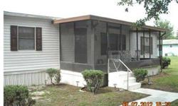 Immaculate manufactured home-split bedroom plan-large living room-eat in kitchen-inside laundry room-nice screened porch on front and large screened porch on back. Double carport-completely fenced. 2 solid storage sheds.