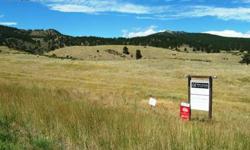 WOW! Amazing views from this stellar lot, surrounded by beauty, mountains & wildlife, while being minutes from downtown Loveland. Custom home to be built by Benchmark Custom Homes. Suggested floorplan has 3 bed/3 bath, 2 sided fireplace in living