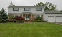 Impressive 5 Bdrm 3/1 BA home in exclusive Marlboro Knoll,minutes from great shopping & NYC bus.Open Liv/Fam Rm designed to provide a warm inviting ambience w decorative columns & molding,FP w rich wood mantel & built in wall unit w/granite