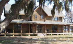 Private Family Ranch! Main house, genuine North Carolina log built home with four bedrooms and four full bathrooms over 3795 square feet under air. Master suite and one bedroom suite are located on the main floor, two bedroom suites are on the second