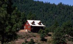 Dramatic views of both Pagosa Peak and Chimney Rock, with a live stream and elk in the foreground! This exceptional property just a few miles west of Pagosa Springs, offers a quiet, protected 24.5 acre setting with a home of over 2,000 square feet,