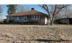 Completely remodeled ranch on 1.8 acres with awesome views of the plains, bluffs, wildlife and open range. Home has woodburning fireplace in large vaulted living room. Other features include open eat-in kitchen, updated bathroom, new electrical,