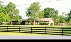 TWO BRICK HOMES on 11.2 ACRES with 4,100 sq. ft. BARN, Bi-Level DECK with Water and Electric, RV Carport with Electric, Additional Double Carport and Many More Extras. Will Consider Dividing - See Details on personal web site www.THEplaceTX.com For NINE