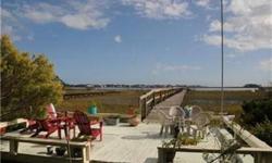 Beautiful setting on the Back River with a dock. Stunning views from the great room and kitchen. Very open floor plan. Sunroom and dining room facing the river. Views of the Tybee Lighthouse.Listing originally posted at http