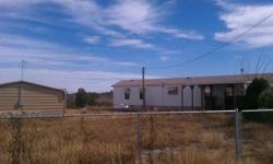 Priced to SELL! Great for first time buyer! Situated on two lots, this mobile home has a lot to offer for the price. Large storage building with electricity and two carports. Located close to Laughlin AFB. ***Seller is offering $1000 Carpet Allowance with