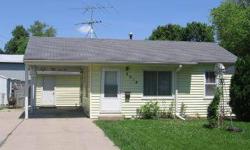 HOME FOR A MECHANIC. Two bedrooms, one bath home with large two car detached garage garage with work area. Vinyl siding and also a carport. Listing agent and office