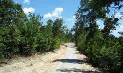 Welcome to a New Level of Vacant Wooded Land.... Tract #5 is fairly level with Far-Away Views. The size is 16.88 Acres. A great building site. This Tract fronts Dogwood Loop Road. Tract #5 id sided on the southwest side by Oak Drive. This Development has