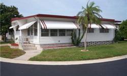 Nicely furnished, well maintained home in very desirable Holiday Shores. Low monthly maintenance, pets permitted. Walk to shopping & restaurants. Large living room and inviting air conditioned Florida Room.Across street from Lake Seminole.Heated pool,