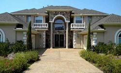 Stunning Toll Brothers Montelena Mediterranean Custom Built home Magnificent 2 story foyer with elegant circular staircases with balcony overlooking from above Chefs kit tith granite ctops gas ctop dbl ssovens overlooks the fam rm Lg Master ste w dlf fp 2