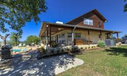HILLTOP PARADISE!! The hill country at its best, this equine friendly 10.13AC 3/2.5 2120 sq ft home and property has it all. Enjoy the infinity pool/hot tub, or just sitting along the wrap around deck, listening to the outdoor stereo system. This home has