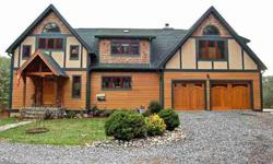 Convenient to Asheville/Weaverville w/mountain views & private location. Wide open spaces in & outside of this custom Timber frame w/upgrades thru out. Huge Master suite w/fireplace & X-large closets; over-sized garage on main + separate shop area in