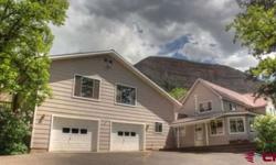 Amazing views, dozens of fruit trees, access to a majestic waterfall and close proximity to town are only a few of the reasons that you must see this property! Situated in the heart of the Animas River Valley, this lovely home boasts over 4100 SF of