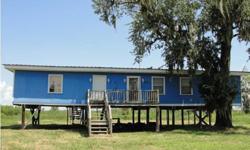 ENJOY YOUR SUMMER, MARDI GRAS PARADE & WEEKENDS IN CYPREMORE POINT IN THIS SPACIOUS 3 BED 2 BATH CAMP WITH WATERVIEWS. NEW FLOORING THROUGHOUT. LARGE BEDROOM COULD BE USED AS ADDITIONAL LIVING AREA OR EVEN CONVERTED INTO 2 BEDROOMS. PARTIALLY FURNISHED;