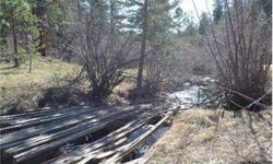 3.19 acres in Buckhorn Canyon with creek frontage! Perfect spot for your mountain getaway or home with nearby National Forest and abundant wildlife. Gently rolling lot with Poderosa Pines, rock outcropping sand southern exposure. Easy year-round access,