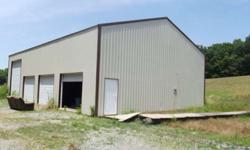 10 Surveyed acres with a 40' x 60' pole barn with 4 overhead doors and concrete floor. Private, but convenient. Great building sites. Electric is on the property and county water is in front of the property. Call today to schedule a showing.
Listing
