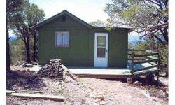 This small cabin has a deck and has breath taking views of the Sangre De Cristo mountains from on top of the hill where it is located. Great hunters cabin, it is only 216 sq. ft. and is a 2 room cabin.Listing originally posted at http
