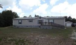 Great Location! Great Price! Beautiful 3 Bedroom 3 Bath Double wide is on 2+ Fenced Acres in a nice Country setting. Master Suite has 'His & Her' Full Baths with walk-in closets.There is a wood burning Fireplace, vaulted ceilings with skylites,2 car