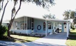 This beautiful and furnished double-wide mobile home is located in Forest Lake Estates on the east side of Zephyrhills, Florida. It has 2 bedrooms & 2 full baths and is being sold "move-in ready". Just bring your personal items and start enjoying your new