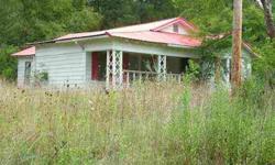 Old Homestead ready for renovation and restoration. Hunter's Paradise - own these 14 acres - nearly all wooded- that joins other wooded tracts minutes from the Tennessee River and all of its recreation! House is that perfect hunting cabin project or