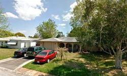 This 2 bedroom, 2 bath, 1 car garage home is located in Magnolia Valley, a community in New Port Richey, Florida. The property has mature landscaping with fruit trees, sliding doors, an open/covered front porch and a sidewalk. The home has ceramic tile