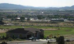 Golf course lot with spectacular views of Cedar City. School Trust land borders the rear of this exceptional lot. Gradual southern slope, ideal for your energy efficient solar home! Long range views to the south and west, including views of Three Peaks.