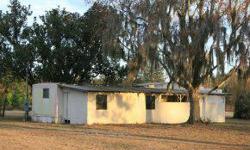 2.67 ACRES WITH FRONTAGE ON US HIGHWAY 301. HOME NEEDS A LOT OF WORK, GOOD FOR BUYER WHO CAN LIVE ON THE PROPERTY WHILE BUILDING ANOTHER. LOTS OF FRUIT TREES. PEAR, CITRUS, PECAN AND OTHERS. VACANT - OWNER HAS PRICED TO SELL.Listing originally posted at