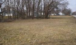 Triple vacant lot to build a new home on the corner of Grand Blvd and Gilbert Dr. Lot size is 30,580 sq ft. Some wooded trees on lot, close to bike trail, fire station and police dept. Quiet location and good neighborhood. The lot can be sold as one unit