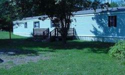 Bank says, "Let's Make a Deal"! This bank-owned 3 bedroom, 2 bath manufactured home on a 126 x 316 parcel in Phelps. Use it as your year round home or as a getaway as the property is located near 1,000's of acres of Nicolet National Forest and also North