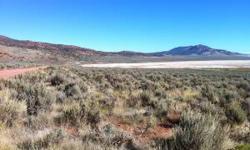 2 separate parcels 25.56 acres and 4 acres. Slightly elevated and mildly sloping, providing panoramic views of the Little Salt Lake, Parowan Gap, Beaver Mountains, Parowan Mountain. Paved road access, 1 acre foot of water included.Listing originally