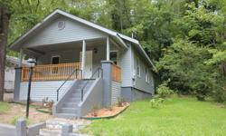 City Cutie!! This 2bdr, 1 bath home is a charmer!! Located close to historic downtown Hot Springs, AR and 1 1/2 blocks from city bus stop. Completely remodeled inside and out--new roof, siding, vinyl windows, wiring, complete kitchen remodel with built in