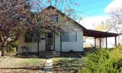 Cute 4 bedroom, 1 bath home located in the heart of Craig! This home has a covered carport, big yard with mature trees and fenced yard. Bank of America Home Loans or Merrill Lynch Prequalification required on all offers. Please allow 2-3 business days for