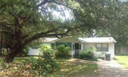 Cute home on large lot shaded by pecan trees. Home has a screened porch and a small deck and is conveniently located with easy access to Interstate 10 and Promenade.Listing originally posted at http