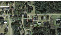 Lot in town mostly cleared. This lot is part of a 5-lot package for $25,000. Lots located in Suwannee Madison and Hamilton Co. All lots must be purchased together. See all referring MLS#s. #81688, #81692, #81689, #81691 All surveys at Buyer's