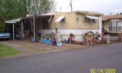 2 bedroom,2 bath mobile home with very nice back yard,flower beds,garden spot,2 sheds,carport and lots of extra storage space.
Located in a 55 senior park.
