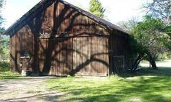One of the few level, undeveloped parcels in the upper valley on the valley floor. Within the Calistoga AVA,the parcel is surrounded by premium vineyards and homes. The value is in the land although there is a vintage barn and small home on the property.
