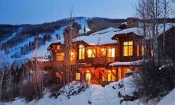 Soaring windows & spacious decks provide unparalleled, panoramic views from this Ski-In/Ski-Out home in Bachelor Gulch. This beautiful stone & timber SF residence boasts an exceptional floor plan of over 7,000 square feet of living space. This fully