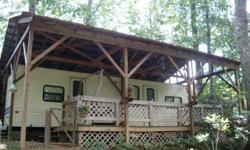 Quiet mountain getaway located in West Jefferson, NC. 1994 30ft prowler in very good condition, sleeps 2-4 comfortably. Camper and huge 8ft x 20ft handbuilt deck completely covered by shelter on large corner lot. **approximately 2 miles from Blue Ridge