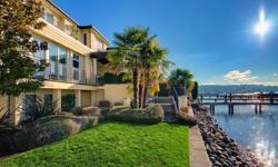 Premier waterfront estate on Lake Ave West with rare, level 97' of shoreline & private dock with boat lift. Custom built in 1999 by Hamish Anderson with the finest quality materials & craftsmanship. Ideal floor plan perfect for entertaining. Expansive