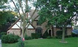 HUGE PRICE REDUCTION! MOTIVATED SELLER SAYS BRING ME AN OFFER! BEAUTIFUL CUSTOM BUILT ENGLISH TUDOR ON NEARLY 1/2 ACRE LOT FEATURES SPACIOUS OPEN LR WITH WB FIREPLACE, GOURMET KITCHEN W/GRANITE COUNTERS, HICKORY CABINETS & SKYLIGHTS, OUTSTANDING MASTER