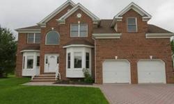 Country Club living in at its best! 5 Bdrm bricked front home on a cul de sac,private bkyd,xtra course full basement w rough plumbing,new Hardwood flrs thru out,9ft ceilings,Grand 2 story light-filled Foyer & Fam/Rm w gas FP,Back staircase.Open CI Kitchen